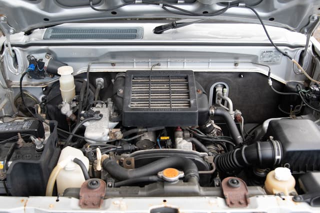 2001 Mitsubishi Pajero Mini JDM car for sale — photo 13 of 14