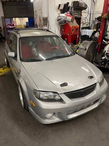2002 Mazda Familia JDM car for sale — photo 3 of 10