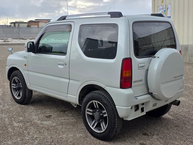 2009 Suzuki Jimny JDM car for sale — photo 4 of 24