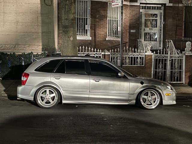2002 Mazda Familia JDM car for sale — photo 5 of 10