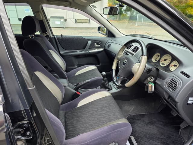 1999 Mazda Familia JDM car for sale — photo 10 of 14