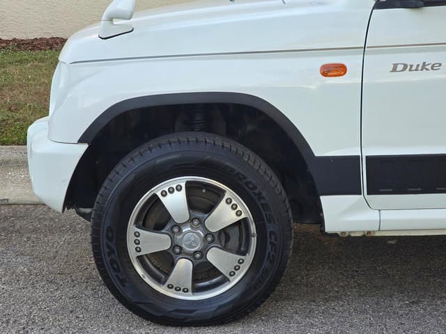 1998 Mitsubishi Pajero Mini JDM car for sale — photo 13 of 25