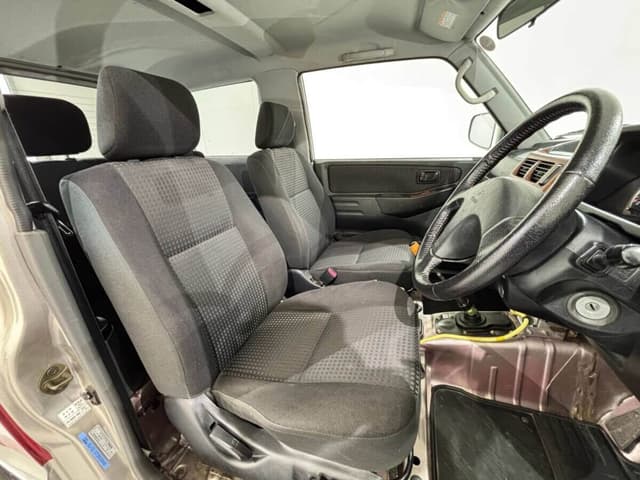 2001 Mitsubishi Pajero Mini JDM car for sale — photo 11 of 25
