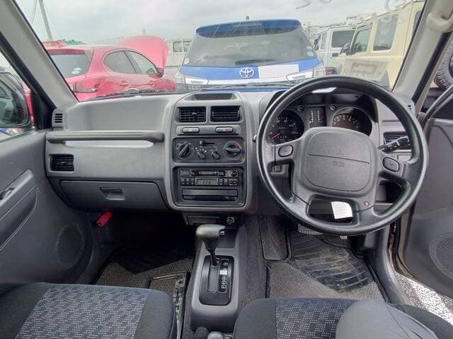 1998 Mitsubishi Pajero Mini JDM car for sale — photo 9 of 17