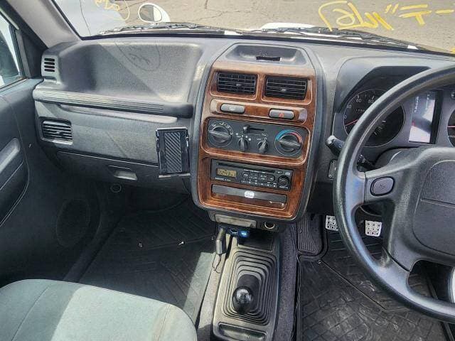 1998 Mitsubishi Pajero Mini JDM car for sale — photo 3 of 9