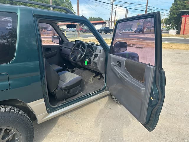 1995 Mitsubishi Pajero Mini JDM car for sale — photo 5 of 12