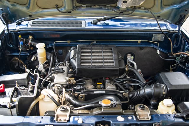 2000 Mitsubishi Pajero Mini JDM car for sale — photo 13 of 15