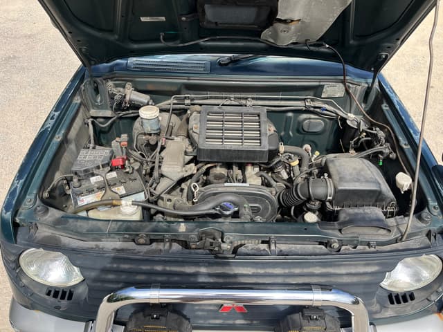 1995 Mitsubishi Pajero Mini JDM car for sale — photo 10 of 11