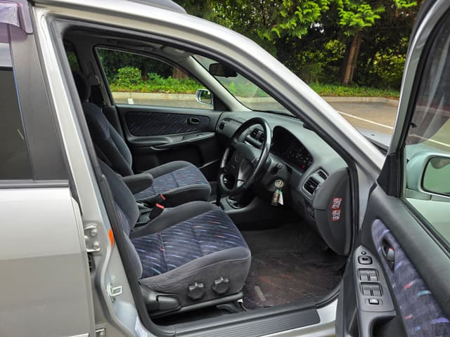 1998 Mazda Familia JDM car for sale — photo 9 of 14