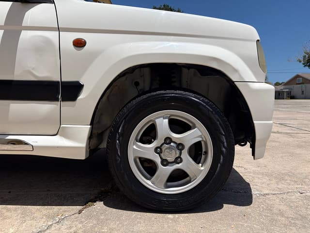 1999 Mitsubishi Pajero Mini JDM car for sale — photo 10 of 17