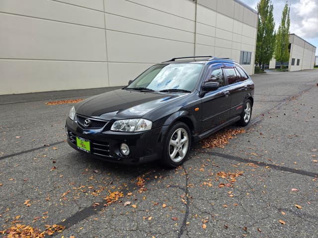 1999 Mazda Familia JDM car for sale — photo 7 of 14