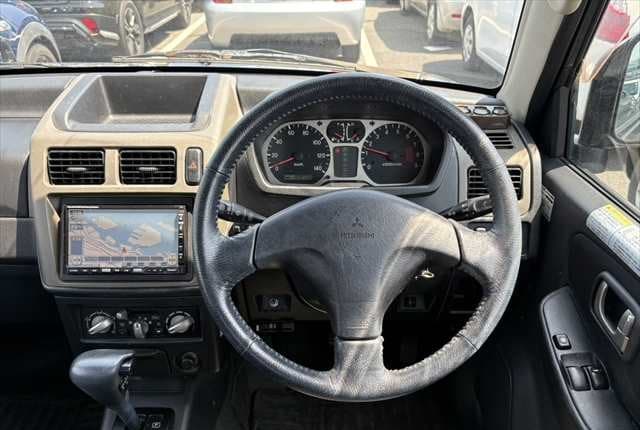2007 Mitsubishi Pajero Mini JDM car for sale — photo 7 of 25