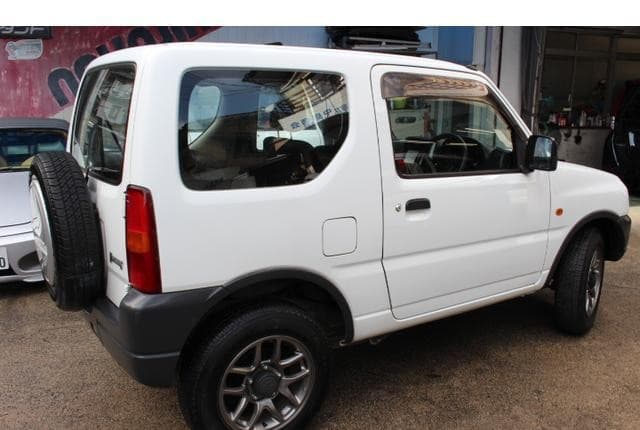 2010 Suzuki Jimny JDM car for sale — photo 10 of 25