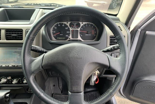2008 Mitsubishi Pajero Mini JDM car for sale — photo 11 of 25