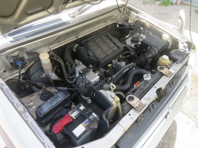 2000 Mitsubishi Pajero Mini JDM car for sale — photo 16 of 21