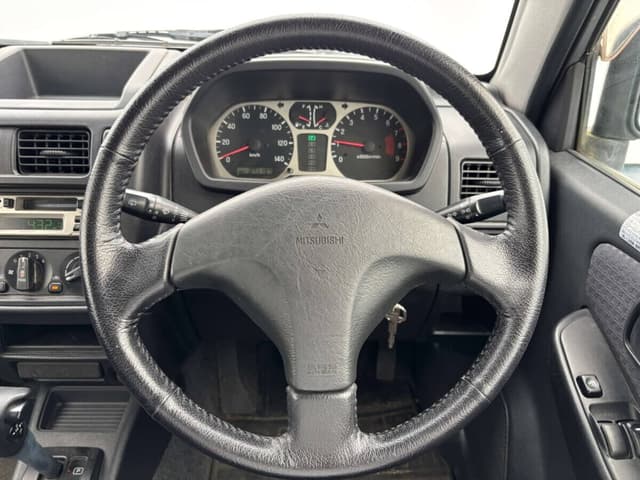 2001 Mitsubishi Pajero Mini JDM car for sale — photo 9 of 10