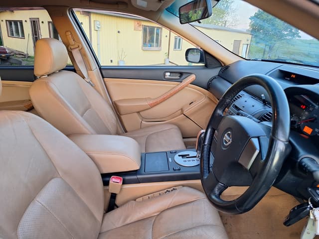 2003 Nissan Stagea JDM car for sale — photo 11 of 16