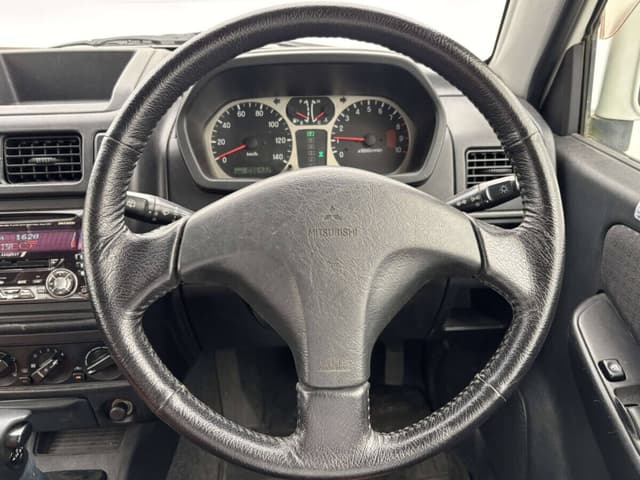 2001 Mitsubishi Pajero Mini JDM car for sale — photo 9 of 10