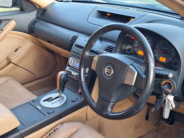 2003 Nissan Stagea JDM car for sale — photo 10 of 16