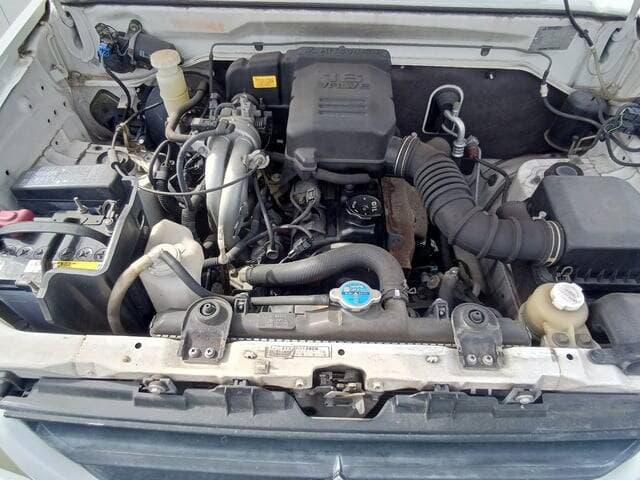 2000 Mitsubishi Pajero Mini JDM car for sale — photo 6 of 25