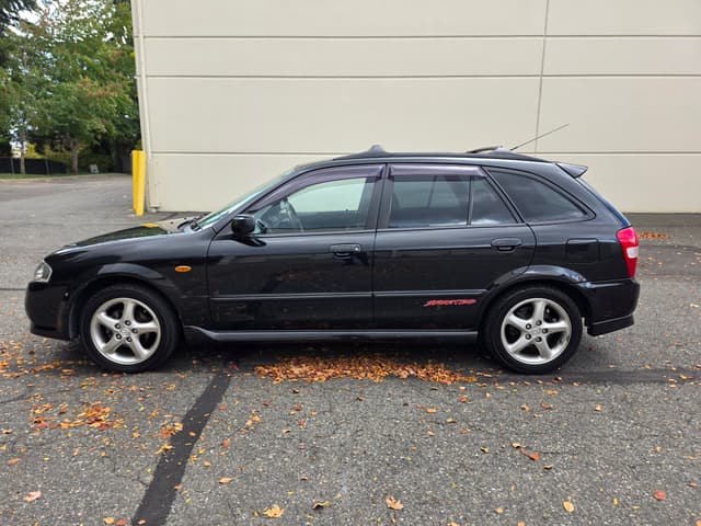 1999 Mazda Familia JDM car for sale — photo 6 of 14