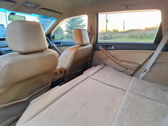 2003 Nissan Stagea JDM car for sale — photo 14 of 16