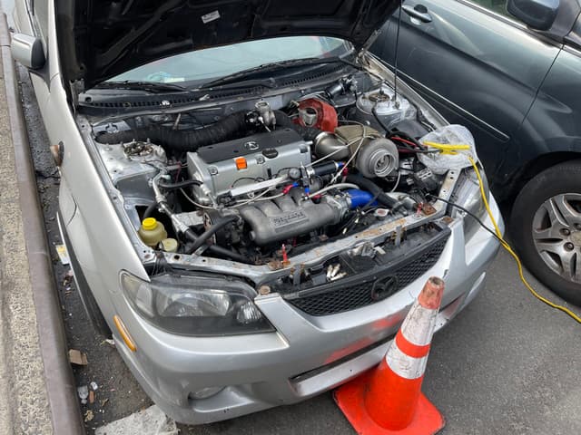 2002 Mazda Familia JDM car for sale — photo 8 of 10
