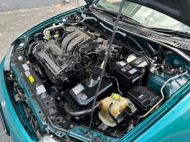 1995 Mazda Axela JDM car for sale — photo 10 of 25