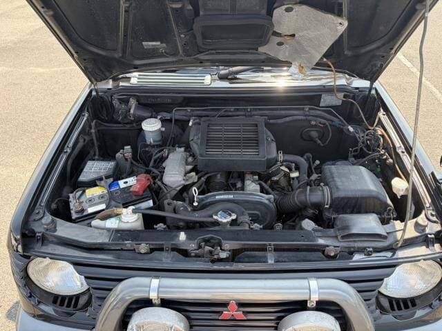 1997 Mitsubishi Pajero Mini JDM car for sale — photo 8 of 9