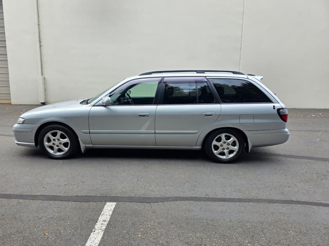 1998 Mazda Familia JDM car for sale — photo 6 of 14