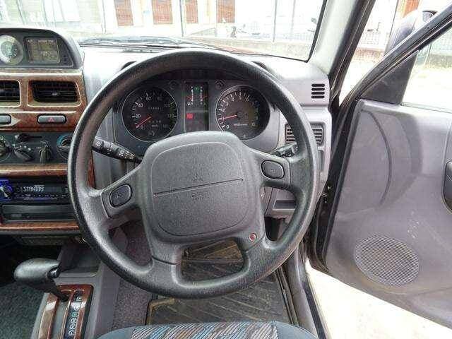 1997 Mitsubishi Pajero Mini JDM car for sale — photo 13 of 20