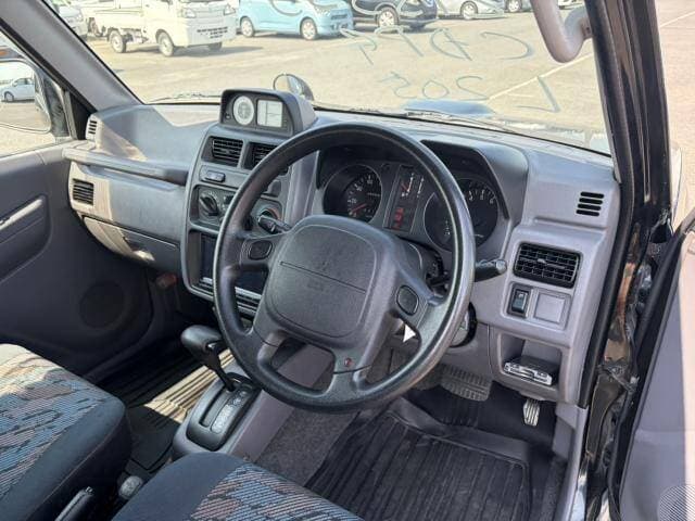 1997 Mitsubishi Pajero Mini JDM car for sale — photo 6 of 9