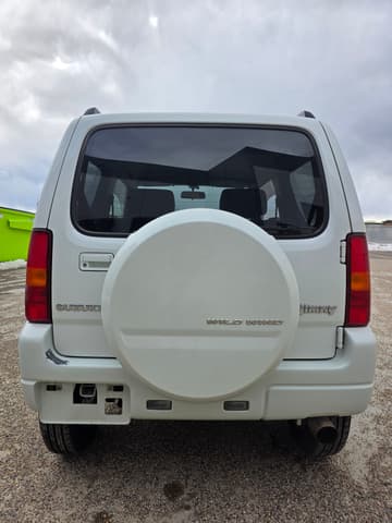 2009 Suzuki Jimny JDM car for sale — photo 6 of 24