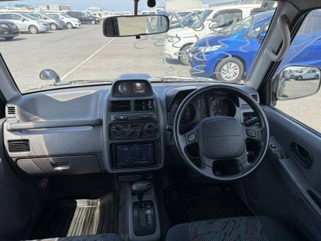 1997 Mitsubishi Pajero Mini JDM car for sale — photo 3 of 9