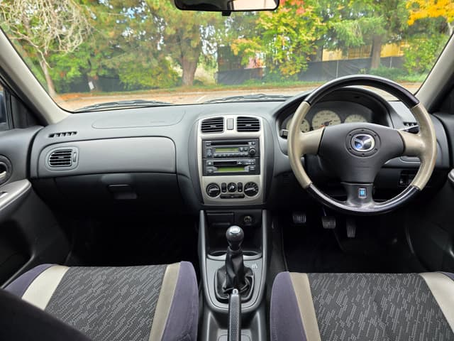 1999 Mazda Familia JDM car for sale — photo 11 of 14