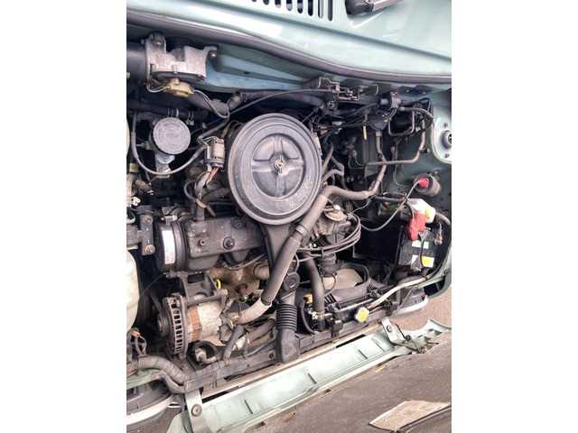1990 Nissan Pao JDM car for sale — photo 4 of 19