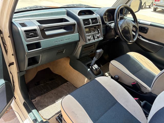 1999 Mitsubishi Pajero Mini JDM car for sale — photo 13 of 17