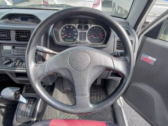 2000 Mitsubishi Pajero Mini JDM car for sale — photo 7 of 25