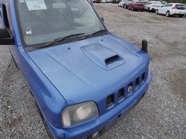 2002 Suzuki Jimny JDM car for sale — photo 12 of 25