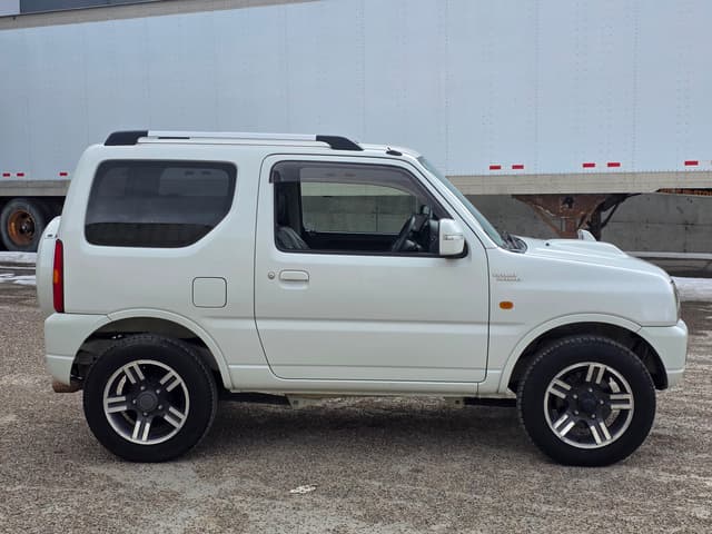 2009 Suzuki Jimny JDM car for sale — photo 3 of 24