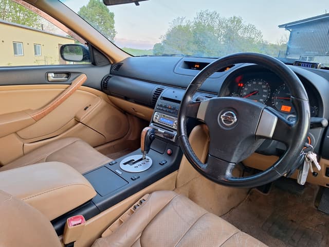 2003 Nissan Stagea JDM car for sale — photo 12 of 16