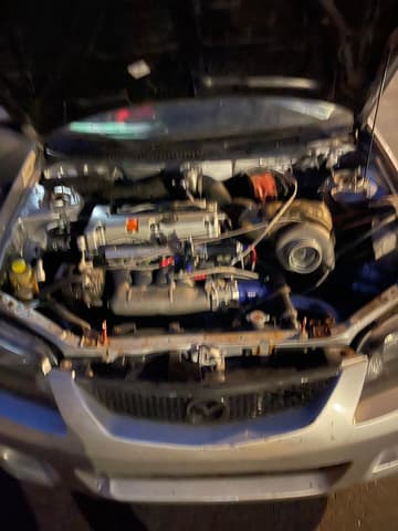 2002 Mazda Familia JDM car for sale — photo 9 of 10